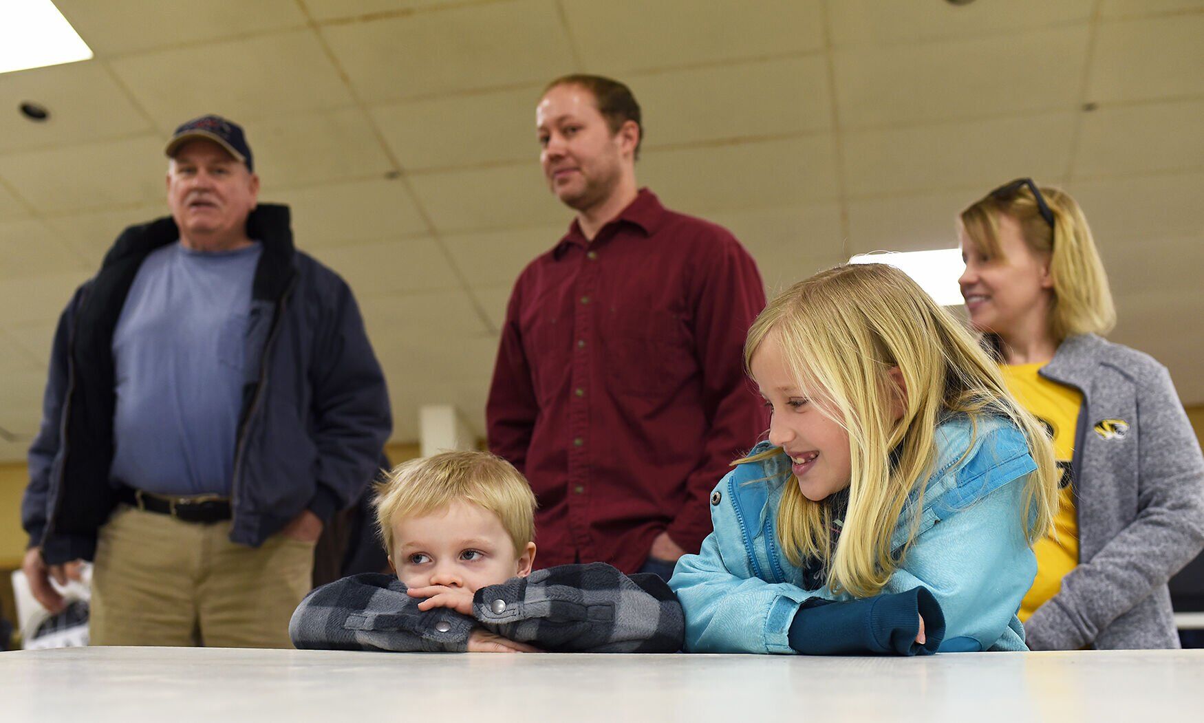Eight-year-old Juliette Westhoff, right, smiles at her brother Jarrett Westhoff, 5.